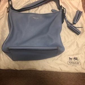 Coach purse comes with storage bag